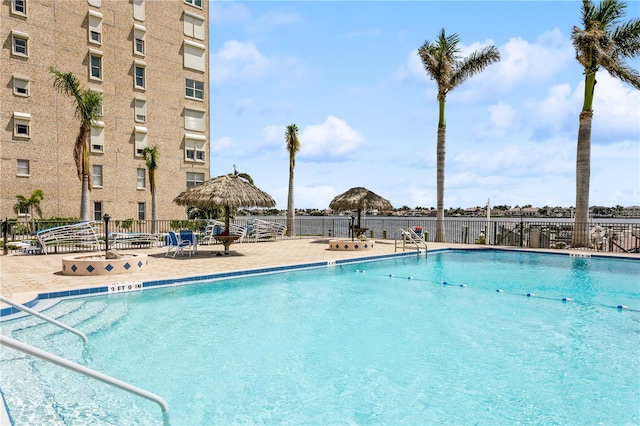 view of swimming pool with a gazebo and a patio