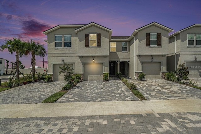 front of property featuring a garage