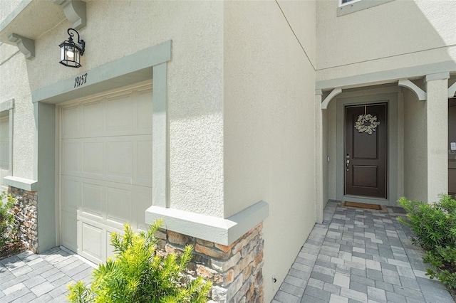 property entrance featuring a garage