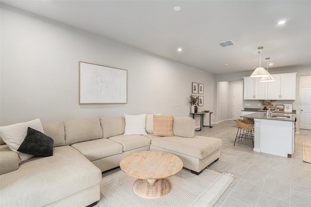 living room with sink