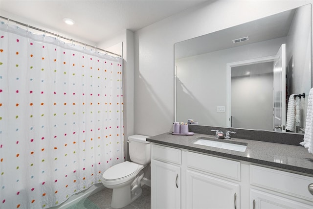 bathroom featuring tile patterned flooring, vanity, toilet, and a shower with curtain