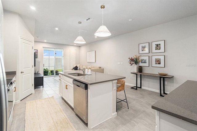 kitchen with sink, white cabinetry, hanging light fixtures, an island with sink, and stainless steel dishwasher