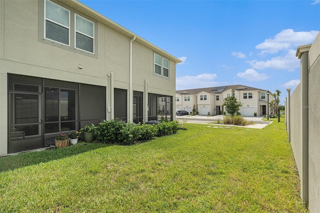 view of yard with a garage