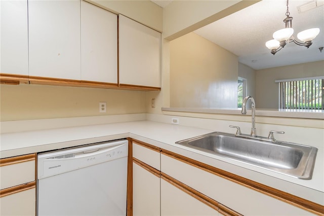 kitchen with a chandelier, white cabinetry, sink, and dishwasher