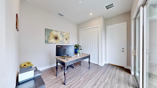 office space featuring light hardwood / wood-style flooring