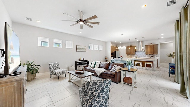 living room with ceiling fan