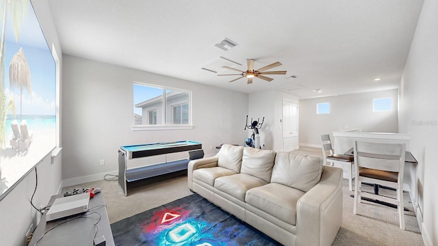 carpeted living room featuring billiards and ceiling fan