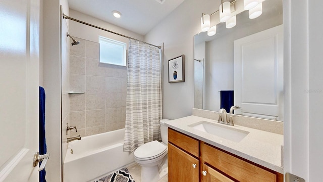 full bathroom with vanity, toilet, and shower / bath combo with shower curtain