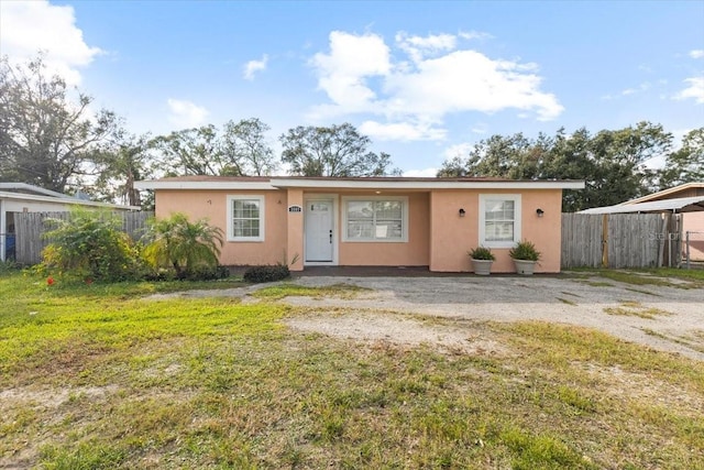 view of front of home with a front lawn