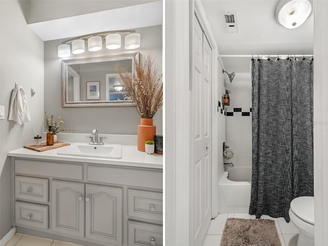 full bathroom featuring tile patterned flooring, shower / tub combo, vanity, and toilet