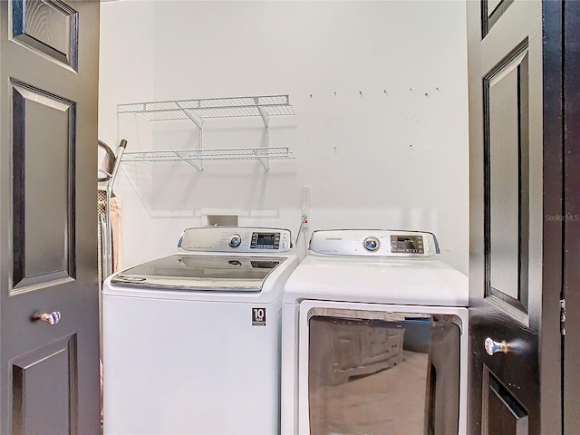 laundry area featuring separate washer and dryer