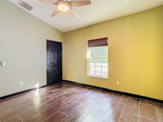 unfurnished room featuring vaulted ceiling and ceiling fan