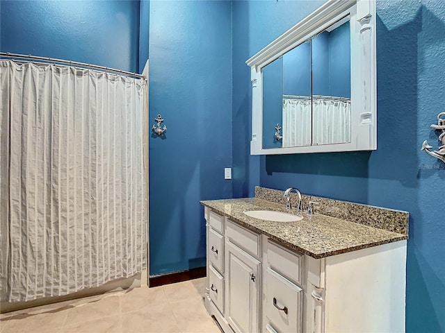 bathroom featuring vanity and tile patterned floors