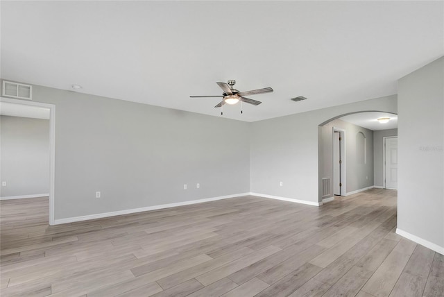 spare room featuring ceiling fan and light wood-type flooring