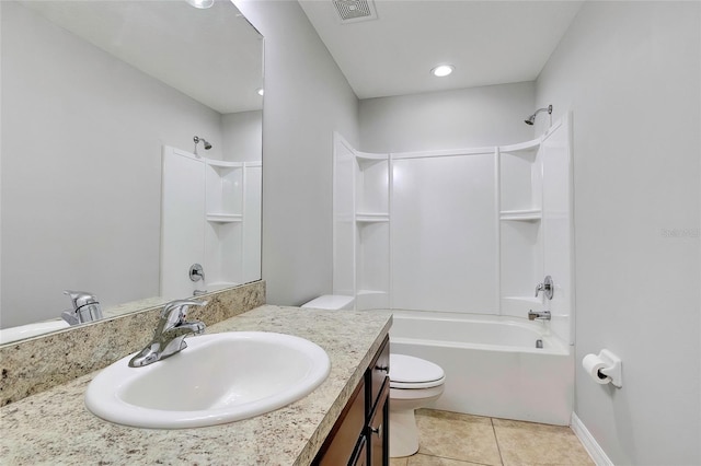 full bathroom featuring tile patterned floors, vanity, toilet, and washtub / shower combination