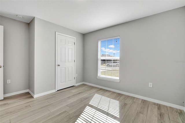 empty room featuring light hardwood / wood-style floors