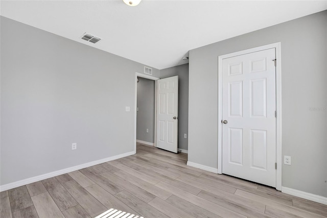 unfurnished bedroom featuring light hardwood / wood-style flooring