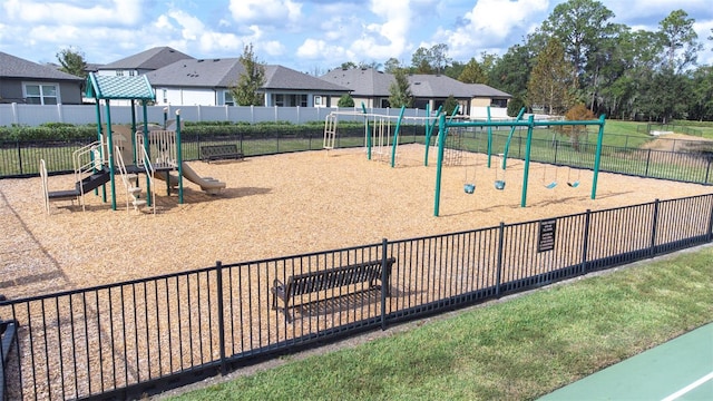 view of home's community with a playground