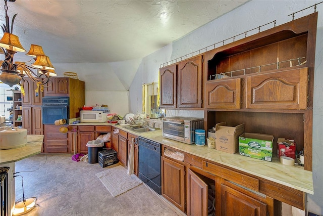 7923 18th Ave E, Palmetto, FL 34221 - kitchen featuring black appliances, light countertops, brown cabinetry, and vaulted ceiling