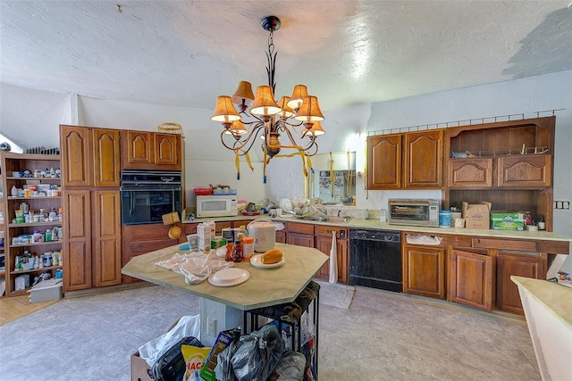 kitchen with a textured ceiling, hanging light fixtures, a notable chandelier, and black appliances