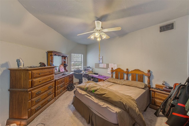 bedroom featuring ceiling fan and light colored carpet