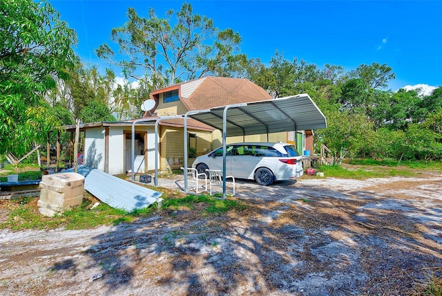 view of parking with a carport