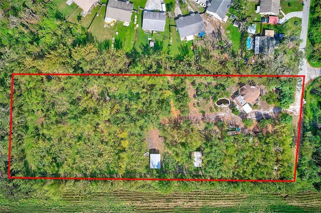 7923 18th Ave E, Palmetto, FL 34221 - aerial perspective of suburban area with property parcel outlined