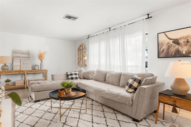 living room with light hardwood / wood-style flooring