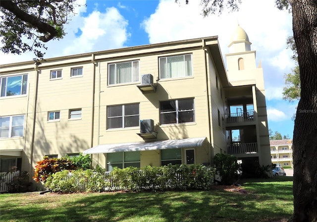 view of building exterior featuring central AC