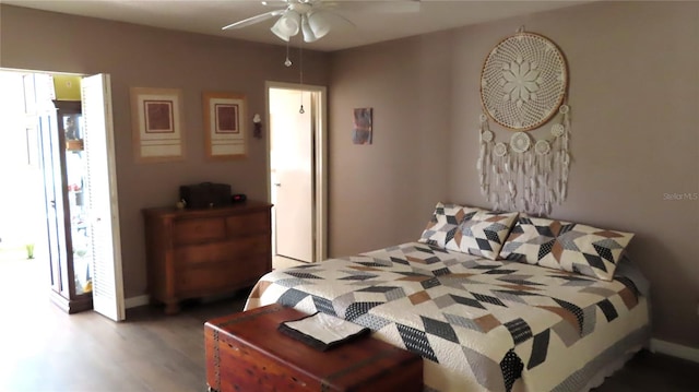 bedroom with ceiling fan and wood-type flooring