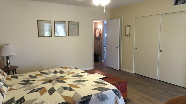 bedroom featuring a closet and wood-type flooring