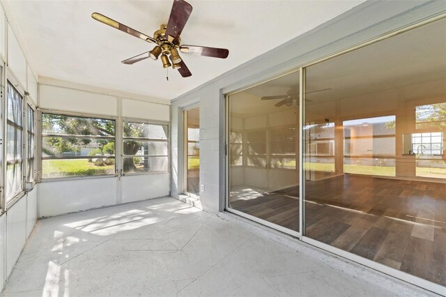 4220 Sheldon Pl Unit 4220, New Port Richey, FL 34652 - unfurnished sunroom with a ceiling fan