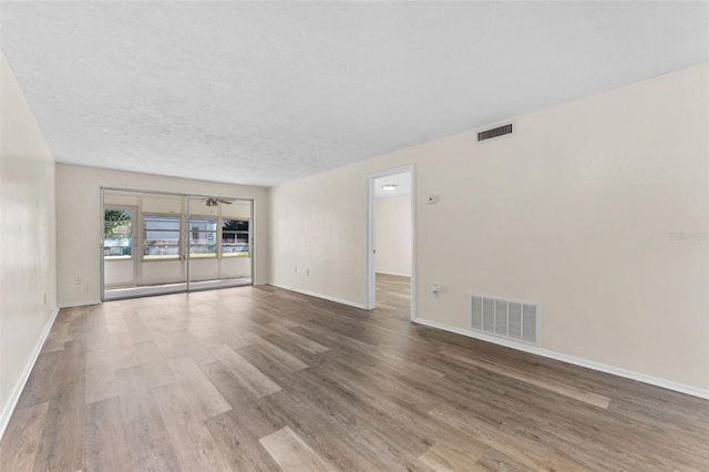 4220 Sheldon Pl Unit 4220, New Port Richey, FL 34652 - spare room with wood finished floors and baseboards