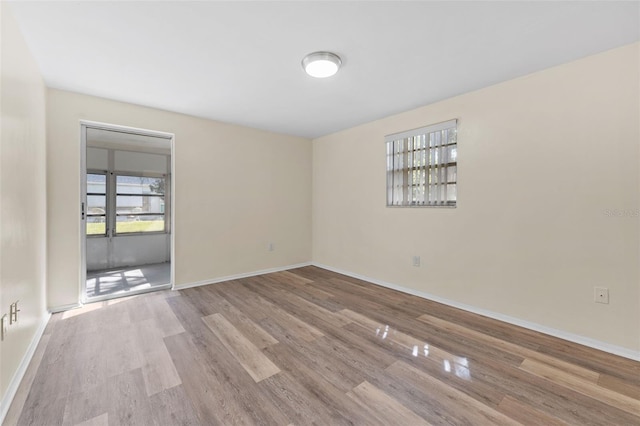 4220 Sheldon Pl Unit 4220, New Port Richey, FL 34652 - empty room featuring wood finished floors and baseboards