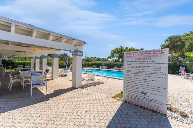 4220 Sheldon Pl Unit 4220, New Port Richey, FL 34652 - community pool featuring a patio, a gazebo, and a ceiling fan