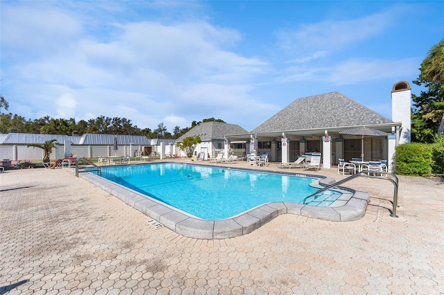 4220 Sheldon Pl Unit 4220, New Port Richey, FL 34652 - community pool featuring a patio