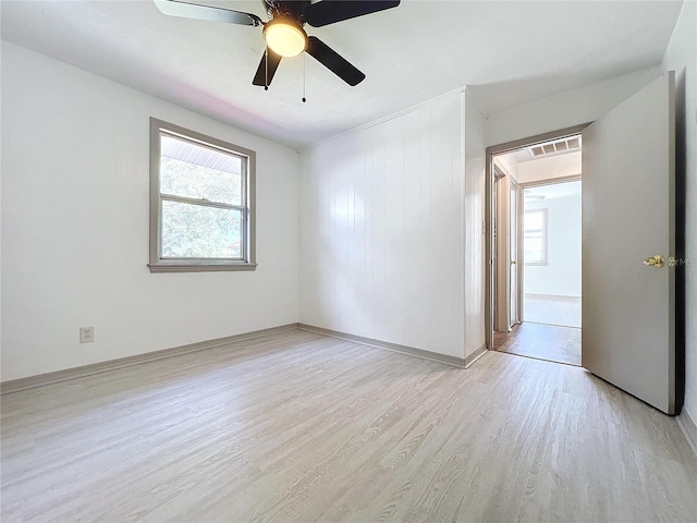 unfurnished room featuring ceiling fan and light hardwood / wood-style floors