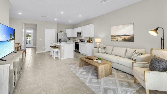 living room featuring light tile patterned floors