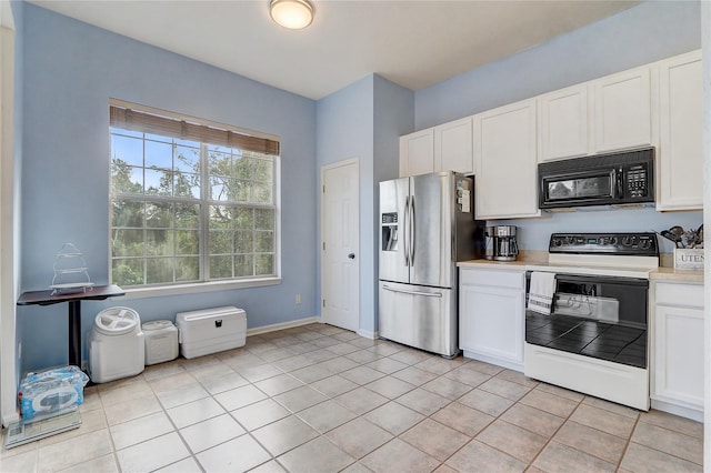 kitchen featuring white cabinets, light tile patterned flooring, white electric range, and stainless steel refrigerator with ice dispenser