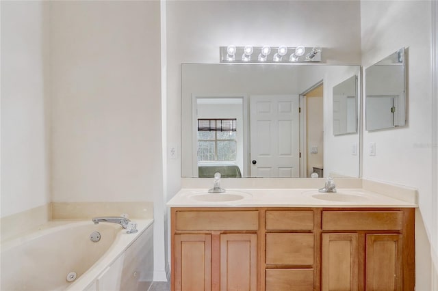 bathroom featuring vanity and a bathtub