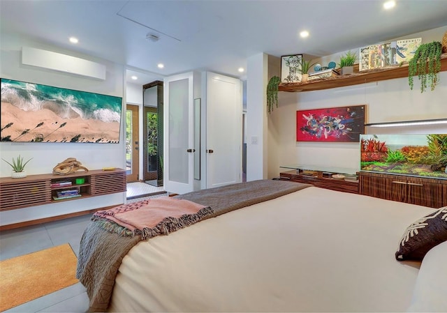 tiled bedroom with a wall unit AC