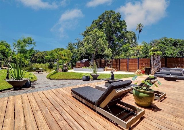 wooden deck featuring outdoor lounge area