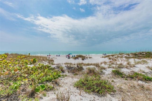 property view of water featuring a beach view