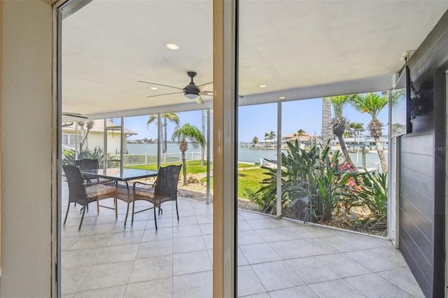 11683 Grove St, Seminole, FL 33772 - sunroom / solarium with a water view, healthy amount of natural light, and ceiling fan