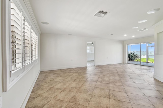 11683 Grove St, Seminole, FL 33772 - empty room featuring ornamental molding and recessed lighting