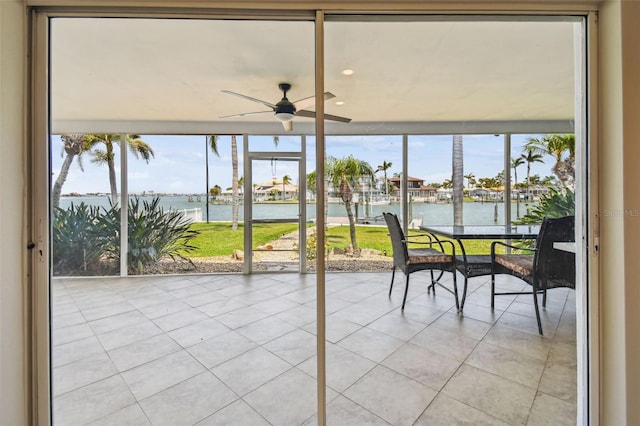 11683 Grove St, Seminole, FL 33772 - sunroom / solarium with a water view, tile patterned floors, and recessed lighting