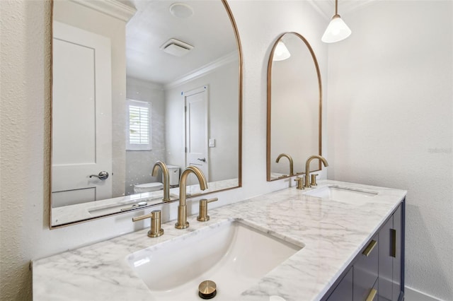 11683 Grove St, Seminole, FL 33772 - bathroom featuring ornamental molding and double vanity