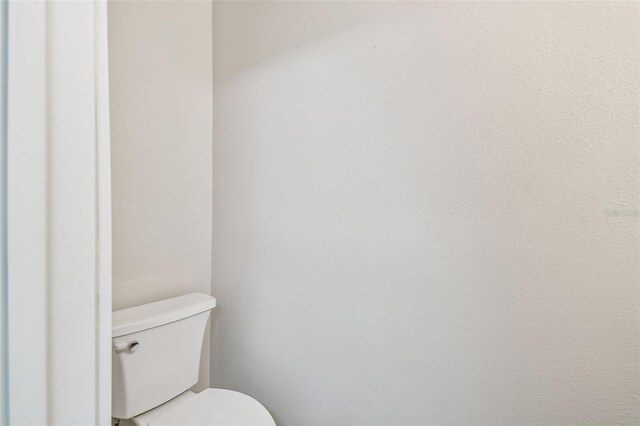 11683 Grove St, Seminole, FL 33772 - bathroom featuring toilet
