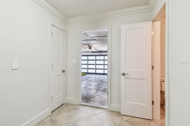 11683 Grove St, Seminole, FL 33772 - doorway to outside with crown molding and light tile patterned floors