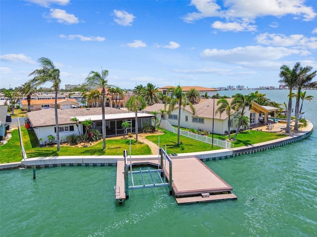 11683 Grove St, Seminole, FL 33772 - dock area featuring a water view and a yard